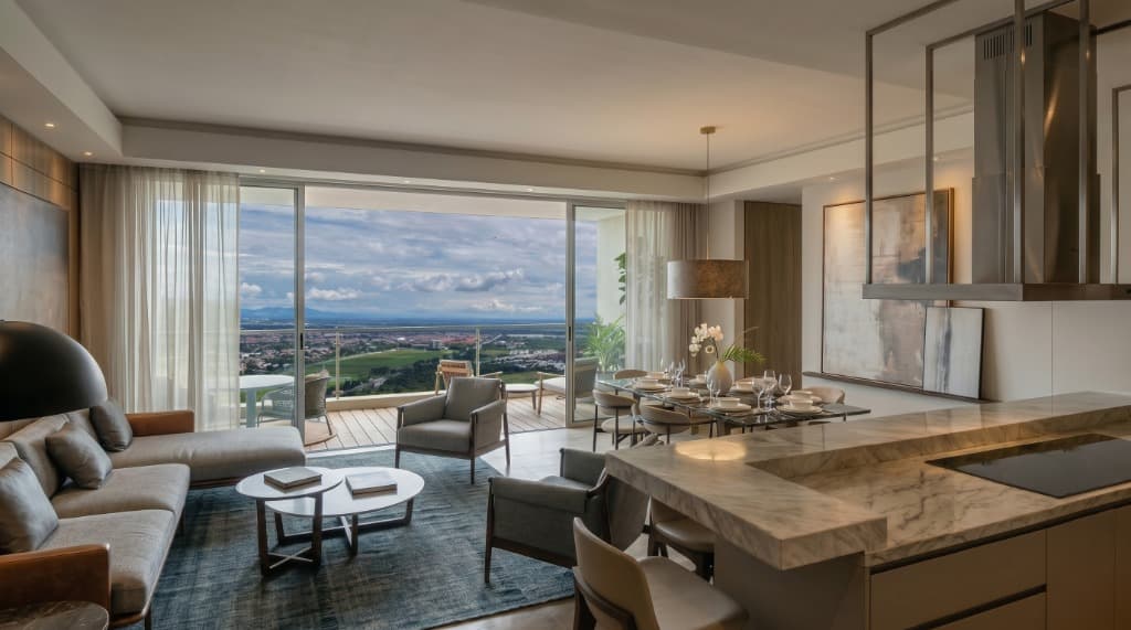 Living room with panoramic view in an Ébano apartment