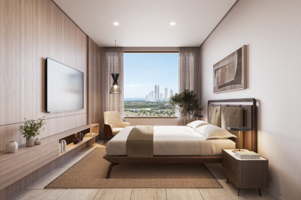 Bedroom with a view of the city in an Ébano apartment