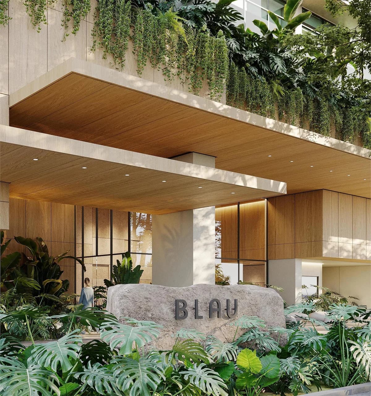 Landscaped entrance with the Blau stone sign, Costa del Este