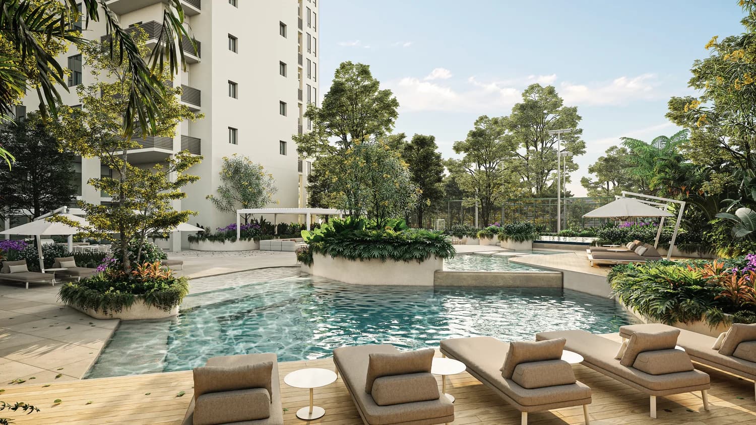 Swimming pool and sun loungers in the gardens of Blau